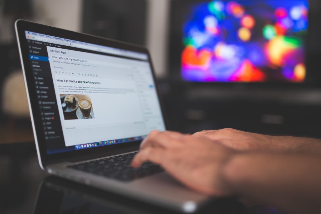 person blogging on a computer